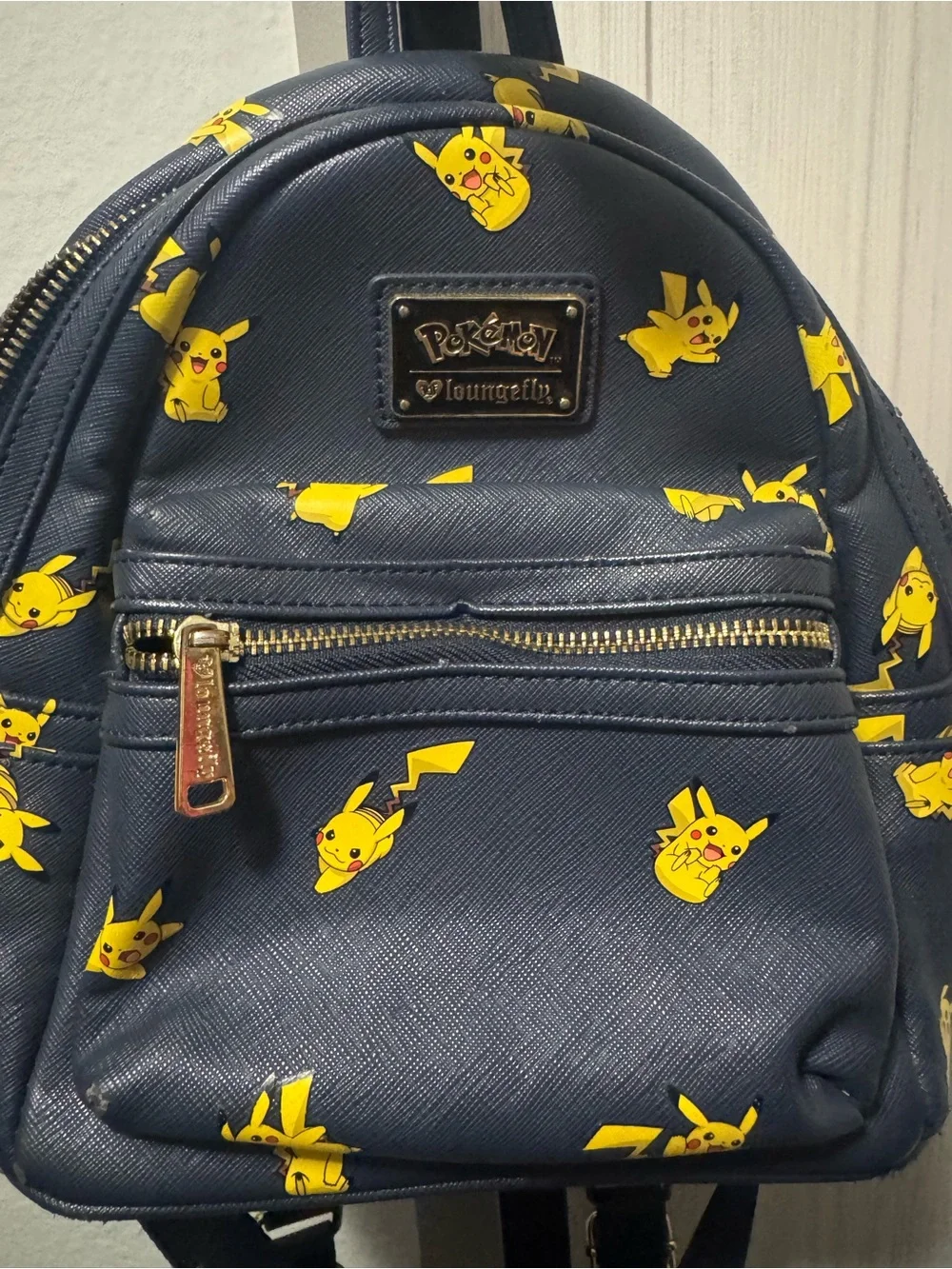 Loungefly Navy Mini Backpack with Yellow Pikachu Print